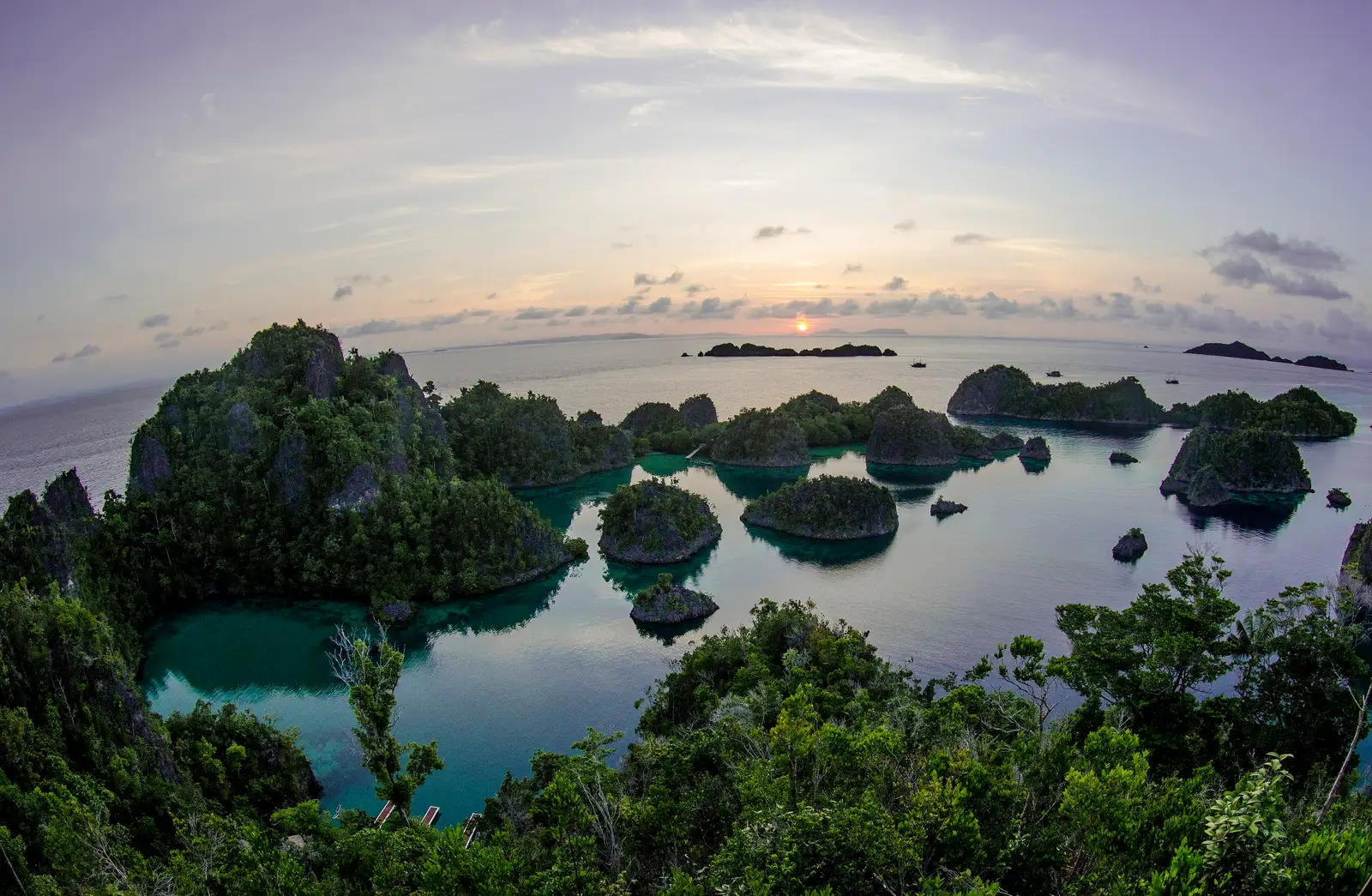 Dawn light over the Raja Ampat islands from a ridge viewpoint